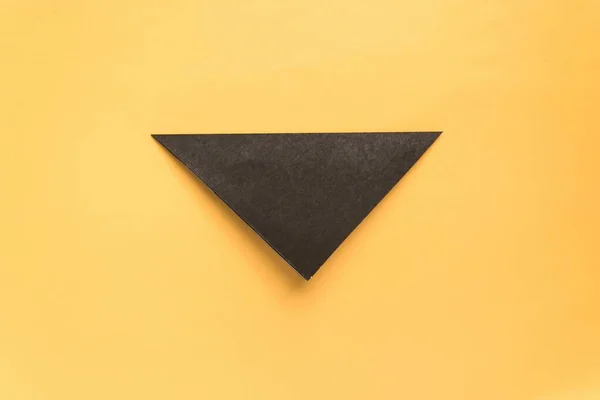 Step by step photo instruction how to make origami paper hat. Halloween hat of witch. Simple diy with kids childrens concept.
