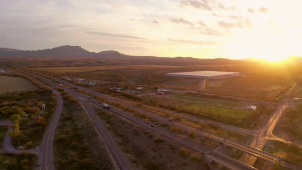 Drone panning over Nogales Highway at sunset — Stock video