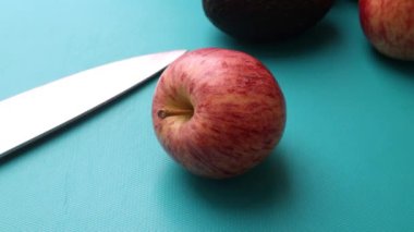 Chef preparing fruits on chopping board for healthy salad