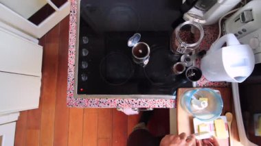 Top view person making coffee with butter and MCT oil 