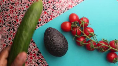 Top view chef making healthy vegetarian salad in kitchen