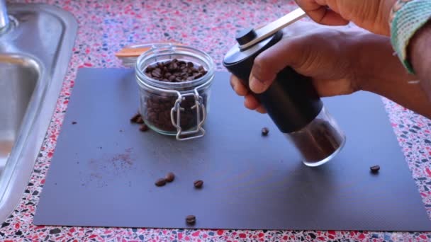 Person Grinding Roasted Coffee Beans Prepare Espresso Coffee — Stock Video