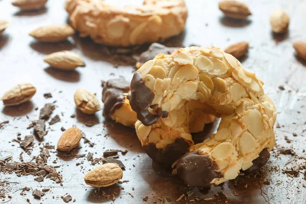 Homemade shortbread cookies with almonds and chocolate. Crispy dessert for tea and coffee. Selective focus