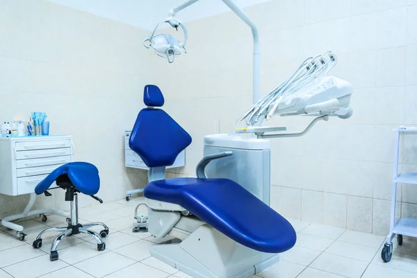 Dentist's chair in a modern interior. No people, just an office. The concept of business development. Quarantine in dentistry and business