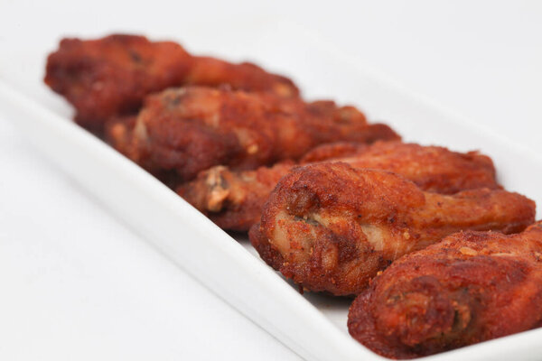 Close Up Fried Chicken Wings isolated on white background