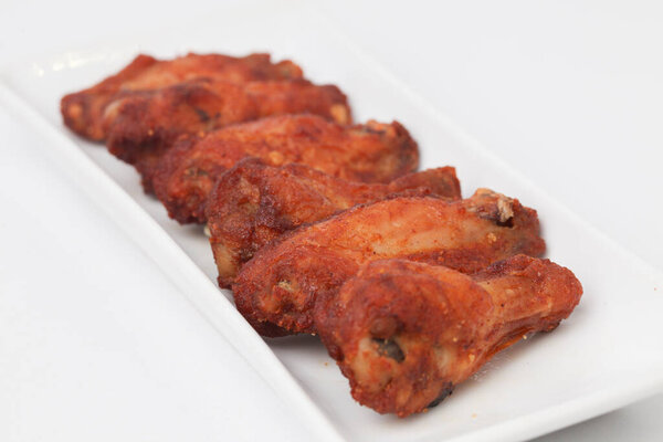 Close Up Fried Chicken Wings isolated on white background