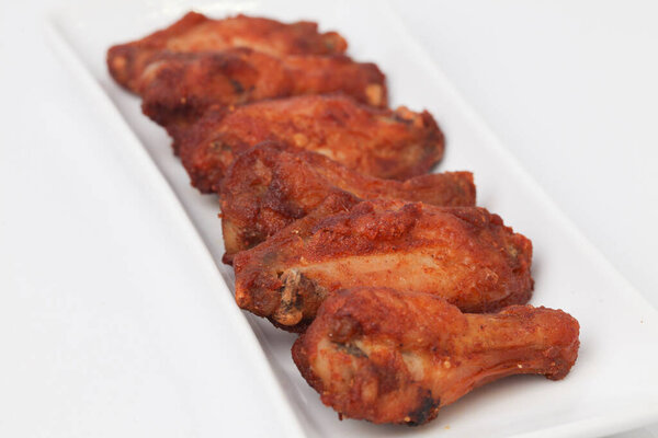 Close Up Fried Chicken Wings isolated on white background