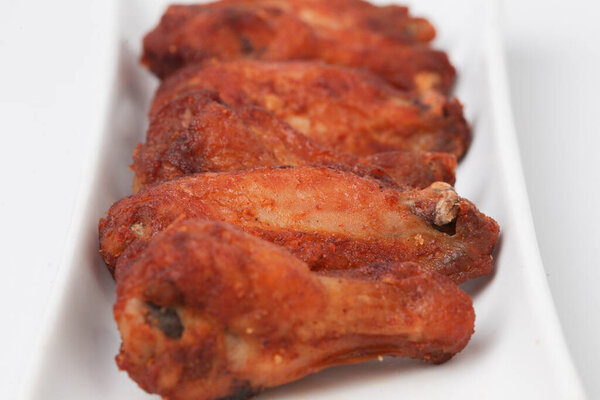 Close Up Fried Chicken Wings isolated on white background