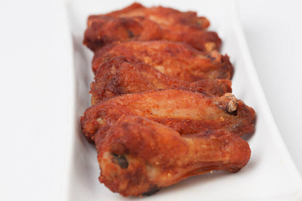 Close Up Fried Chicken Wings isolated on white background