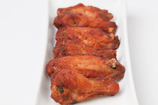 Close Up Fried Chicken Wings isolated on white background