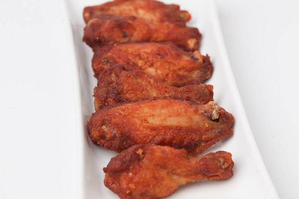 Close Up Fried Chicken Wings isolated on white background
