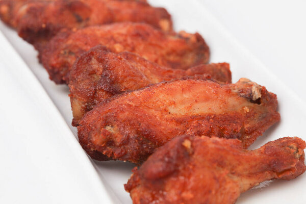 Close Up Fried Chicken Wings isolated on white background