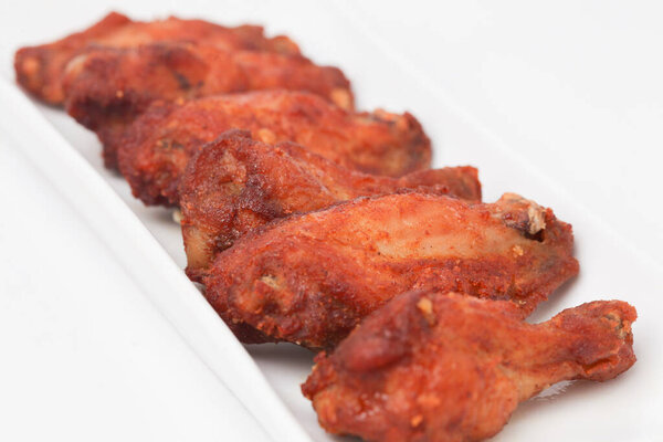 Close Up Fried Chicken Wings isolated on white background