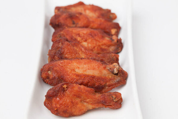 Close Up Fried Chicken Wings isolated on white background