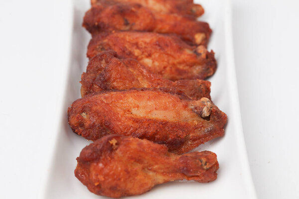 Close Up Fried Chicken Wings isolated on white background