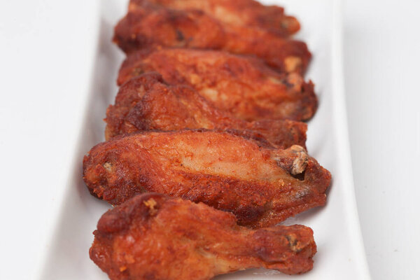 Close Up Fried Chicken Wings isolated on white background