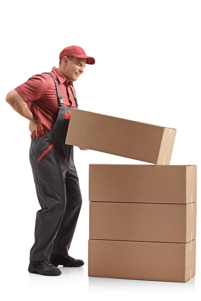 Full Length Profile Shot Mover Lifting Package Experiencing Back Pain — Stock Photo, Image