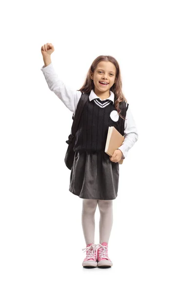 Full Length Portrait Little Schoolgirl Backpack Book Gesturing Happiness Isolated — Stock Photo, Image