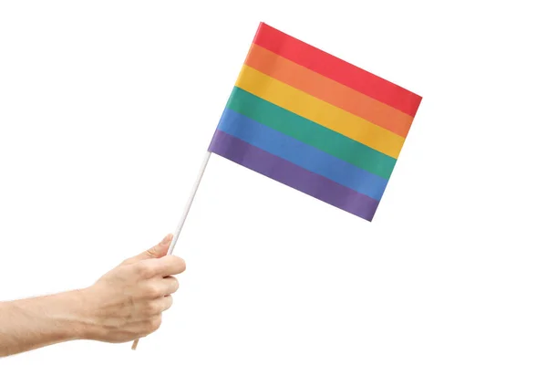 Mano Masculina Sosteniendo Una Bandera Arco Iris Aislada Sobre Fondo — Foto de Stock