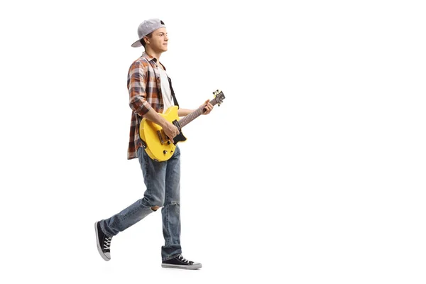 Full Length Profile Shot Teenage Boy Walking Playing Electric Guitar — Stock Photo, Image