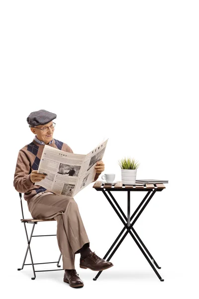 Elderly Man Sitting Coffee Table Reading Newspaper Isolated White Background — Stock Photo, Image