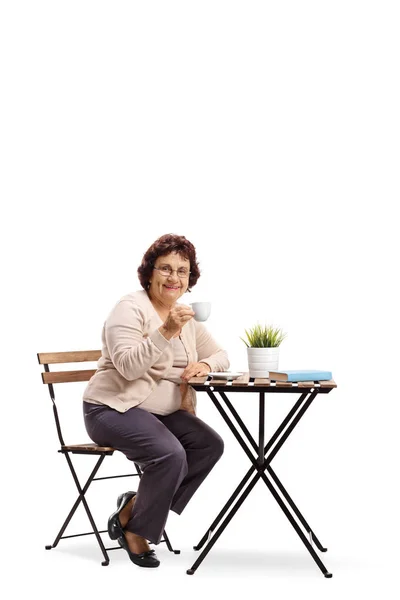 Mature Woman Sitting Coffee Table Isolated White Background — Stock Photo, Image