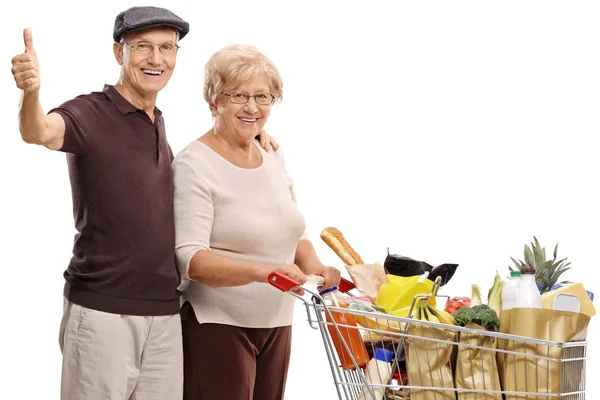 Senioren Mit Einkaufswagen Die Auf Weißem Hintergrund Vereinzelt Daumen Nach — Stockfoto