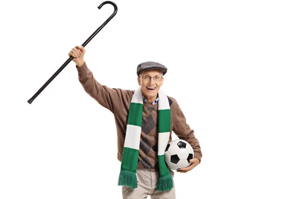 Överlycklig Äldre Fotboll Fläkt Med Käpp Och Fotboll Som Isolerad — Stockfoto