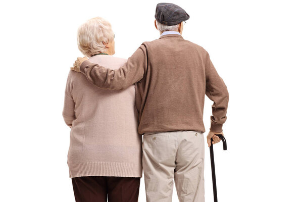 Rear view shot of an elderly couple isolated on white background
