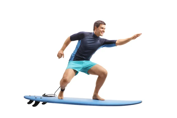 白い背景に分離されたサーフボードでサーフィン サーファーの完全な長さのプロフィール撮影 — ストック写真
