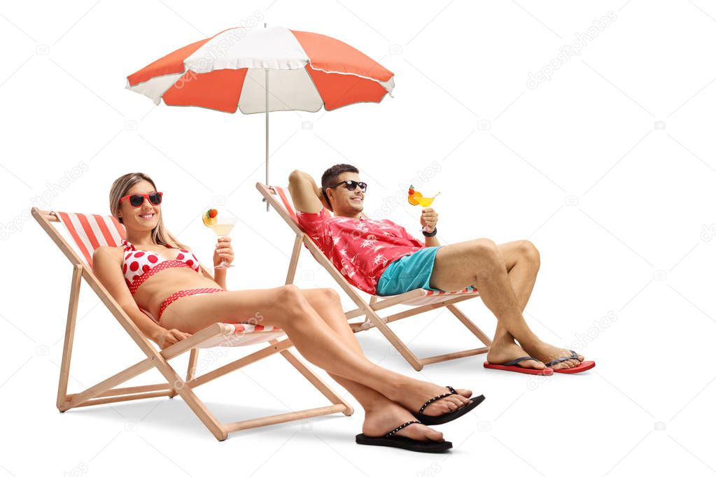 Tourists with cocktails sitting in deck chairs isolated on white background