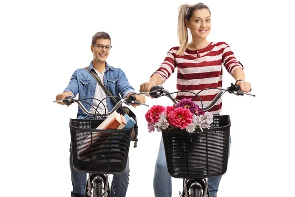 Joven Hombre Una Joven Mujer Montando Bicicletas Aisladas Sobre Fondo —  Fotos de Stock