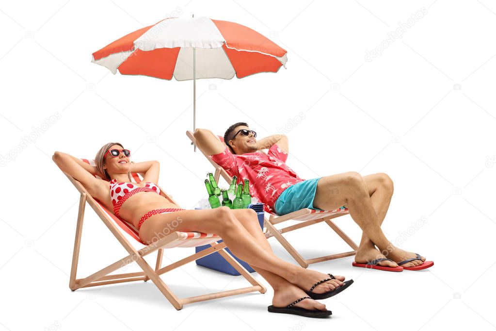 Tourists lying in deck chairs isolated on white background