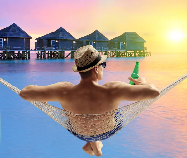 Young Man Bottle Beer Lying Hammock Water Cottages Resort Maldives — Stock Photo, Image