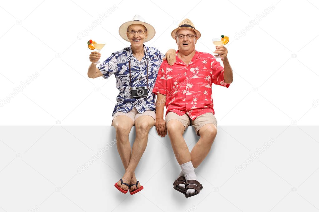 Elderly tourists with cocktails sitting on a panel isolated on white background
