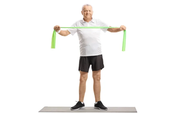 Full Length Portrait Mature Man Exercising Rubber Band Isolated White — Stock Photo, Image