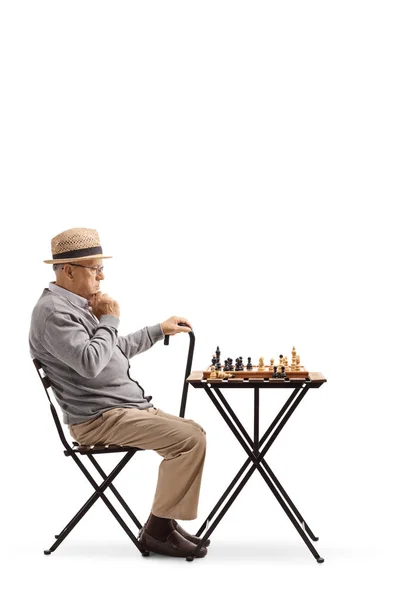 Pensive Mature Man Looking Chessboard Isolated White Background — Stock Photo, Image