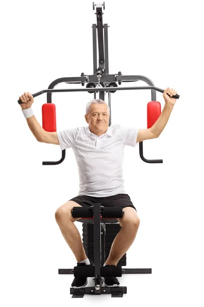 Mature Man Working Out Multifunctional Machine Isolated White Background — Stock Photo, Image