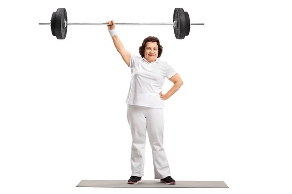 Full Length Portrait Mature Woman Standing Exercise Mat Lifting Barbell — Stock Photo, Image