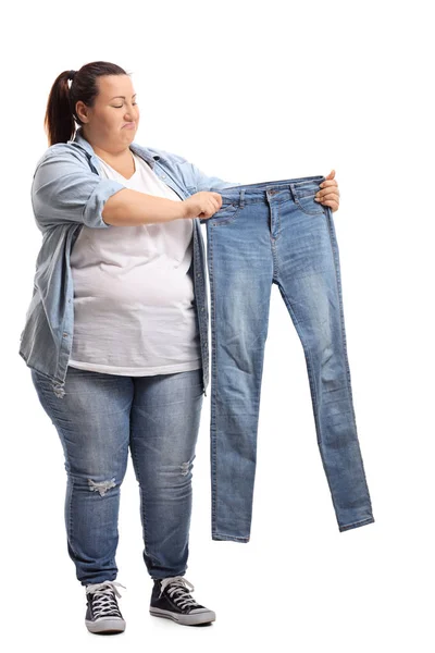 Full Length Portrait Overweight Woman Holding Pair Small Jeans Isolated — Stock Photo, Image