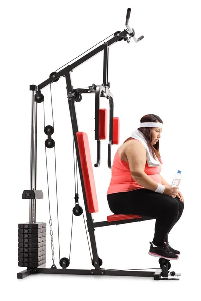 Overweight Woman Sitting Exhausted Exercising Machine Isolated White Background — Stock Photo, Image