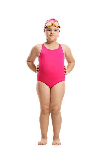 Full length portrait of a little girl in a swimming suit, cap and googles isolated on white background