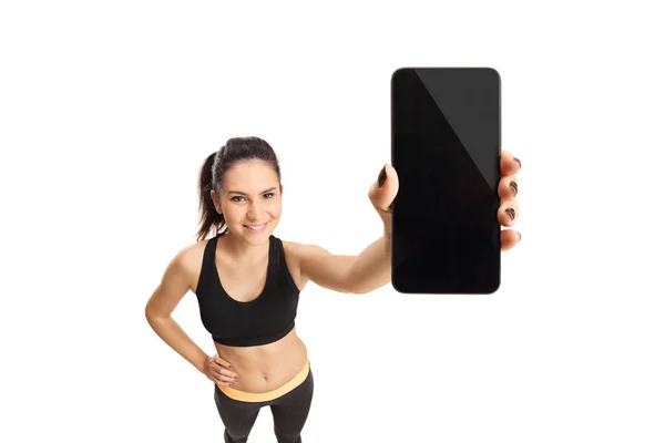 Young Woman Sportswear Holding Cell Phone Isolated White Background — Stock Photo, Image