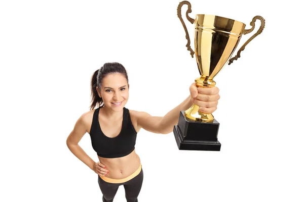 Young Female Sportswear Holding Gold Trophy Cup Isolated White Background — Stock Photo, Image