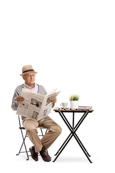 Elderly Man Sitting Coffee Table Reading Newspaper Isolated White Background — Stock Photo, Image