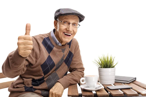 Senior Zitten Aan Een Tafel Van Koffie Maken Van Een — Stockfoto