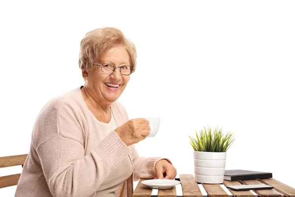 Elderly Woman Sitting Table Drinking Coffee Isolated White Background — Stock Photo, Image