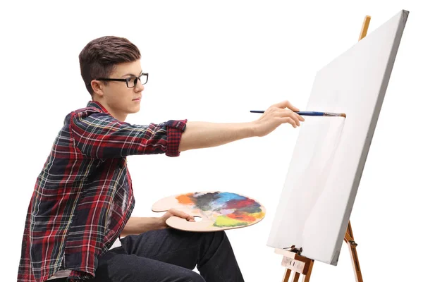 Teenage Ragazzo Pittura Una Tela Isolata Sfondo Bianco — Foto Stock