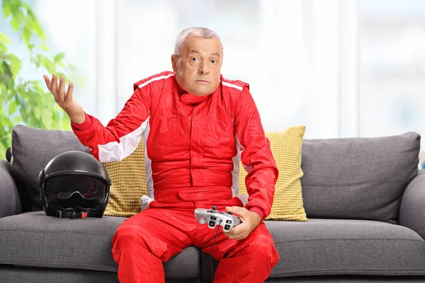 Confused Elderly Man Racing Suit Holding Joystick — Stock Photo, Image
