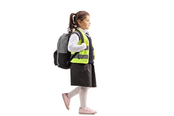 Full Length Profile Shot Schoolgirl Wearing Safety Vest Walking Isolated — Stock Photo, Image